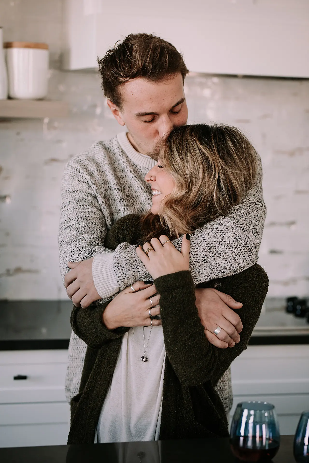 in home engagement session, in home lifestyle session, in home session, calgary photographer, calgary lifestyle photographer, couples posing, couples posing ideas, engagement session ideas, engagement session posing