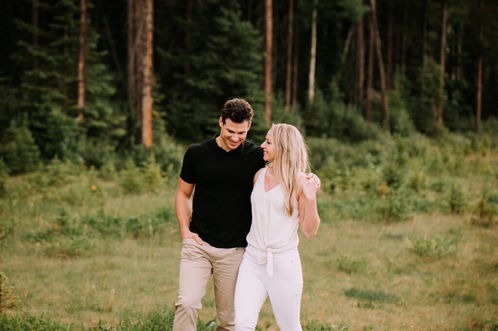 canmore engagement photographers, canmore photographers, mountain engagement session, rainy engagement session, adventure session
