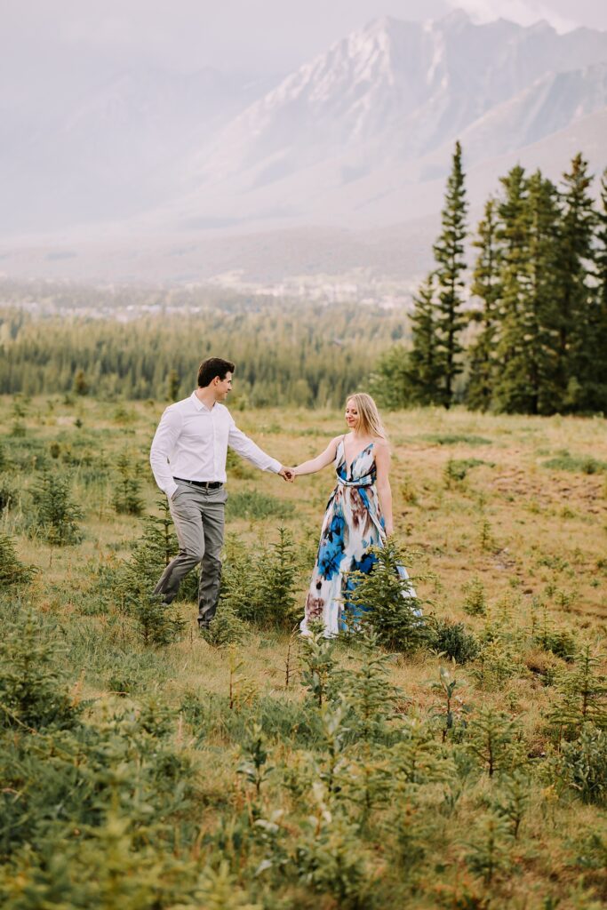 canmore engagement photographers, canmore photographers, mountain engagement session, rainy engagement session, adventure session