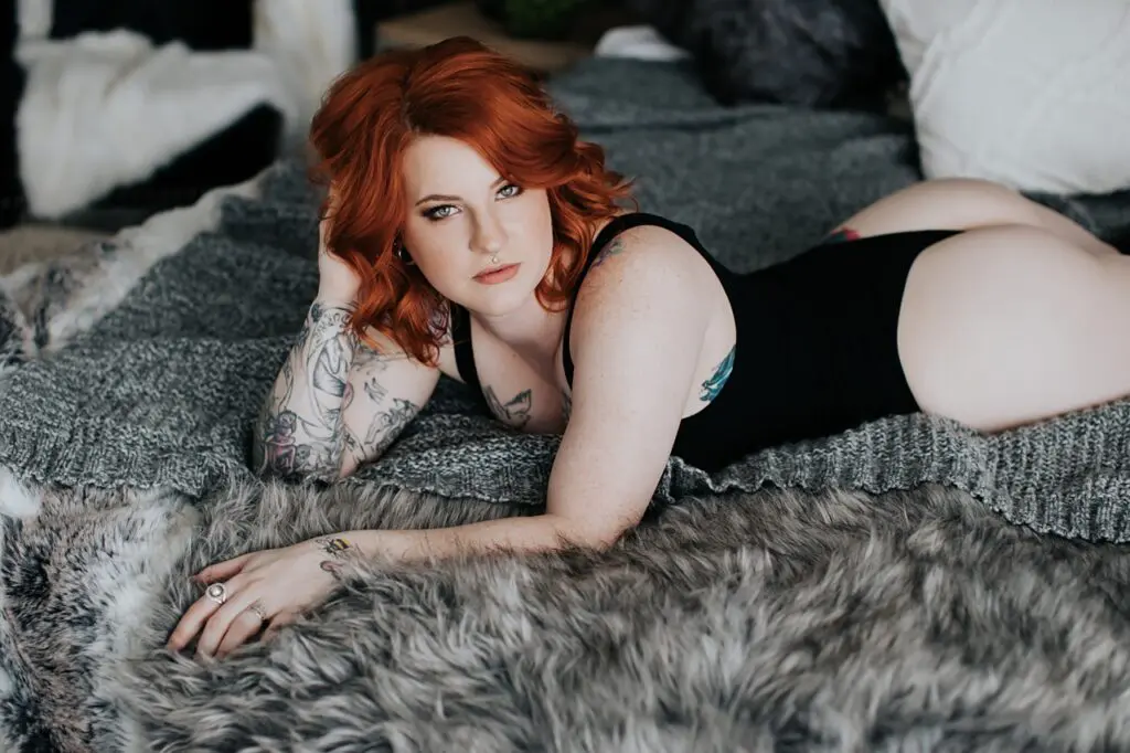 calgary boudoir photographers, tattooed babes, boudoir with tattoos, boudoir ideas, red headed boudoir, boudoir poses, boudoir outfit inspiration