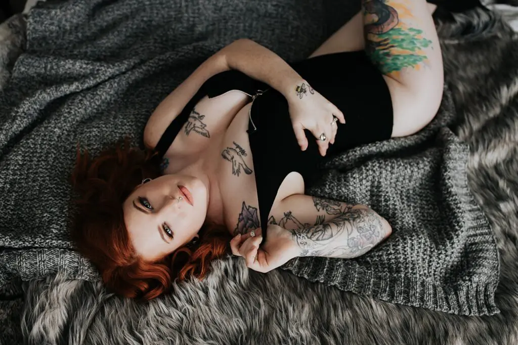 calgary boudoir photographers, tattooed babes, boudoir with tattoos, boudoir ideas, red headed boudoir, boudoir poses, boudoir outfit inspiration