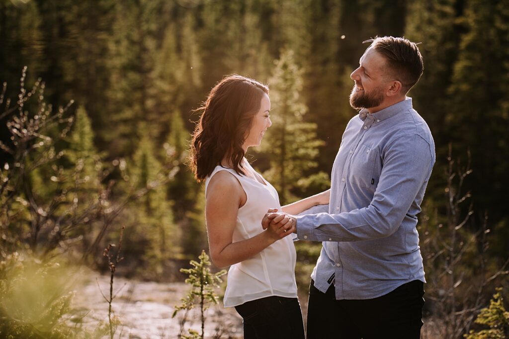 sun drenched canmore engagement session, canmore wedding photographers, canmore engagement photographer, mountain engagement session, summer engagement session