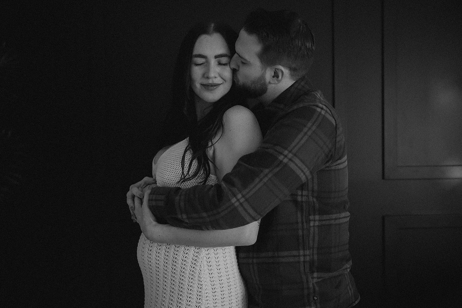 couples maternity session in photography studio
